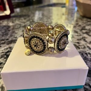 Women’s black and gold bracelet